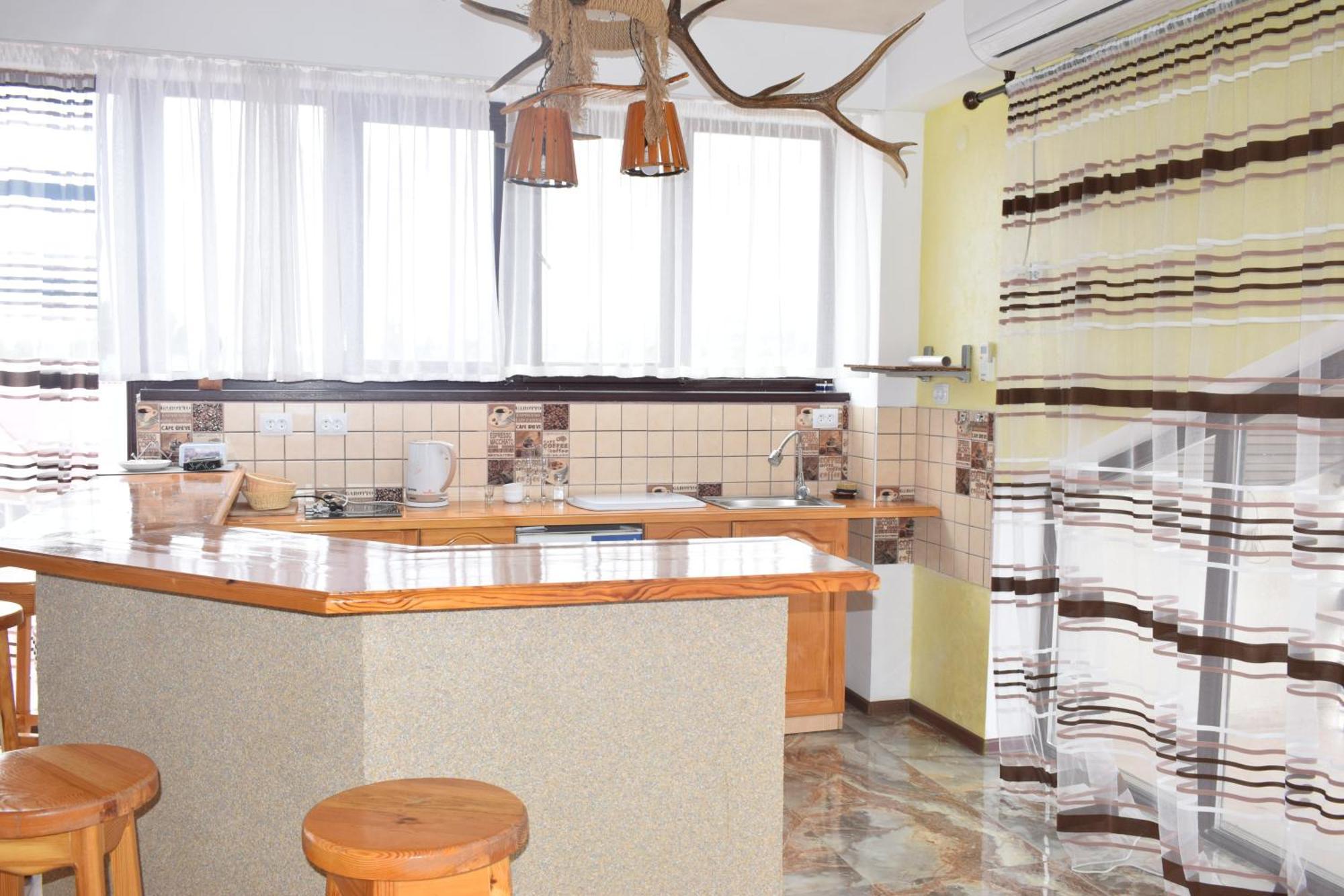Отель У Рыбака Bosteri Esterno foto
